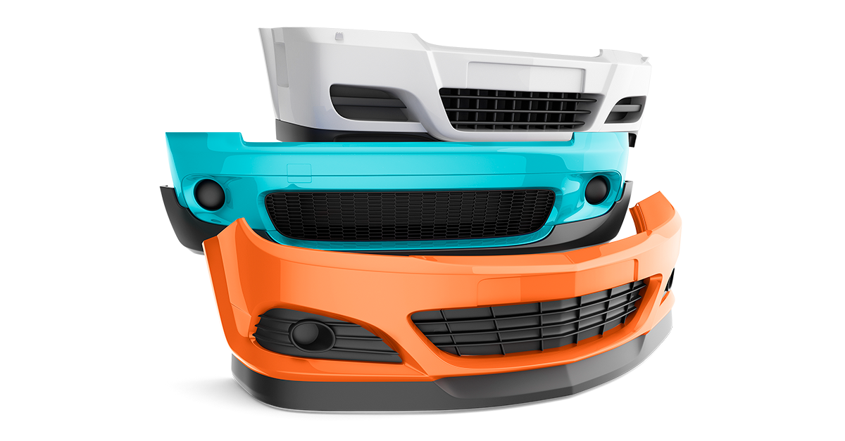 Stack of car front bumpers.