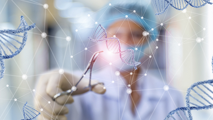 Scientist using tweezers on a strand of DNA