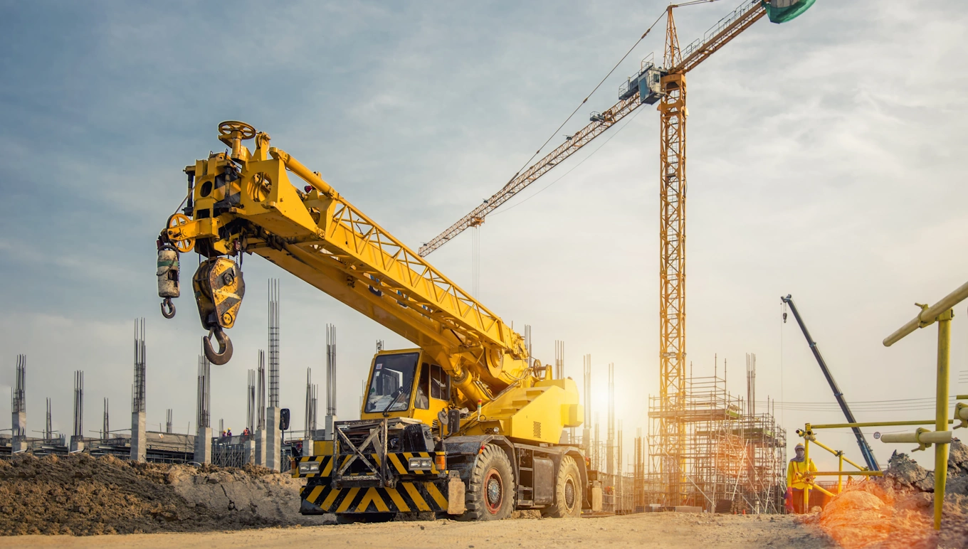 Large truck crane on construction site.